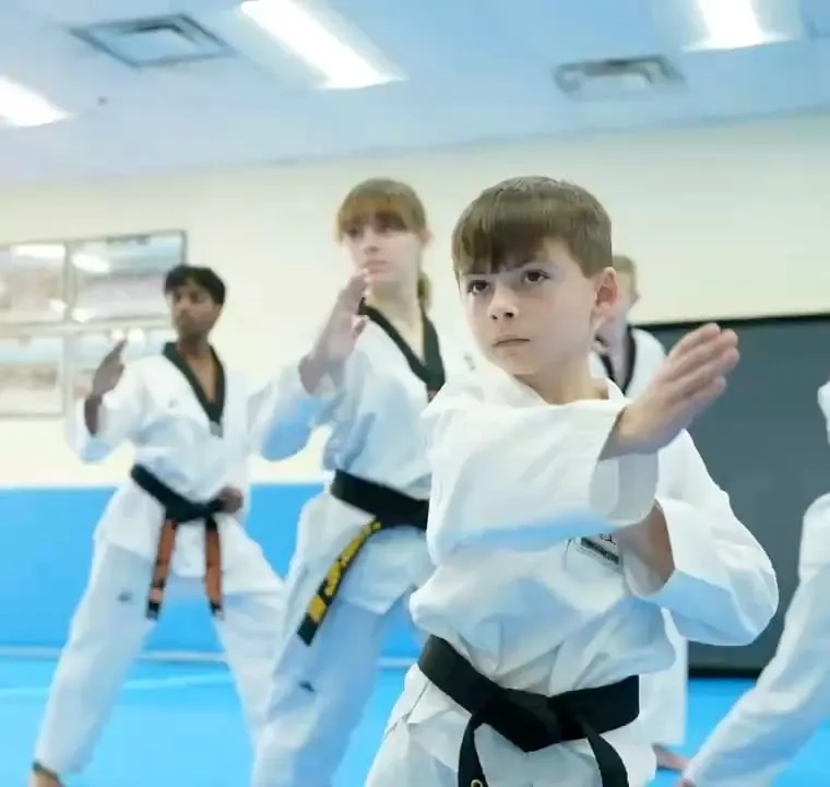Students training Taekwondo in class at S Martial Arts